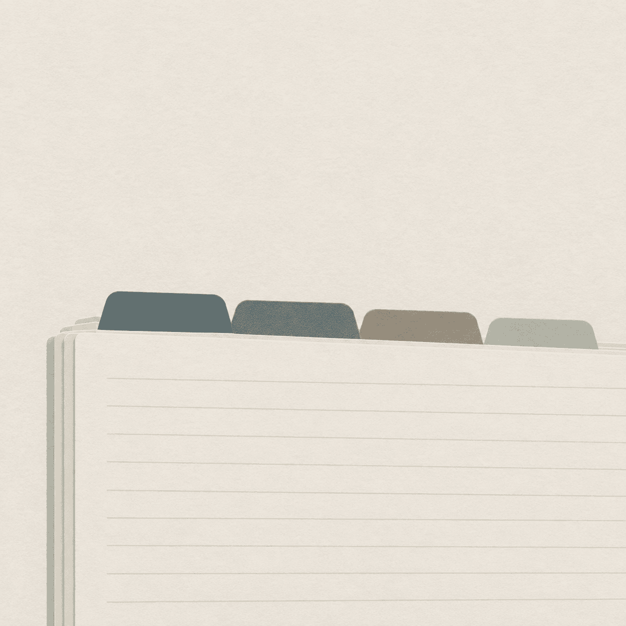 A close row of blank index tabs projecting from the top edge of filed cards.